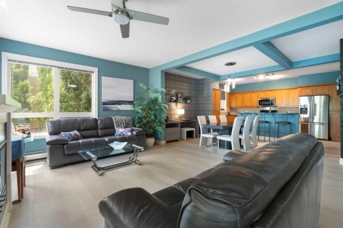 2110-10221 Tuscany Boulevard Nw, Calgary, AB - Indoor Photo Showing Living Room