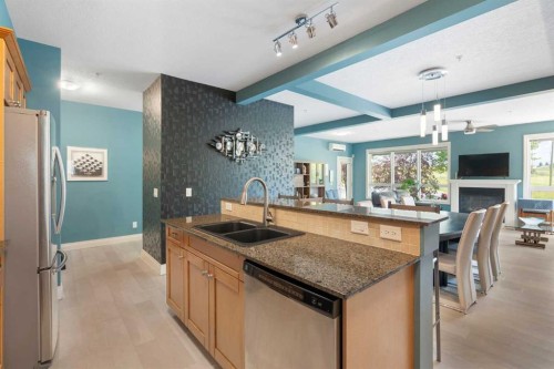 2110-10221 Tuscany Boulevard Nw, Calgary, AB - Indoor Photo Showing Kitchen With Double Sink