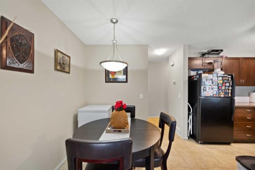90 Panatella Villas Nw, Calgary, AB - Indoor Photo Showing Dining Room