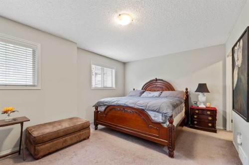 90 Panatella Villas Nw, Calgary, AB - Indoor Photo Showing Bedroom