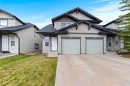 90 Panatella Villas Nw, Calgary, AB  - Outdoor With Facade 