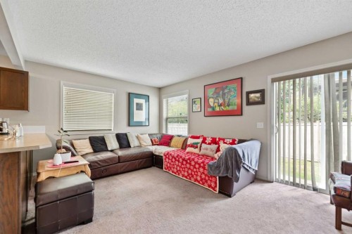 90 Panatella Villas Nw, Calgary, AB - Indoor Photo Showing Living Room