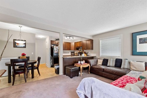 90 Panatella Villas Nw, Calgary, AB - Indoor Photo Showing Living Room