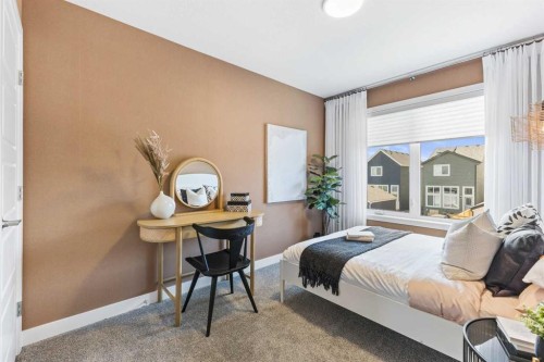 63 Heirloom Boulevard Se, Calgary, AB - Indoor Photo Showing Bedroom