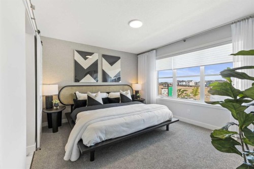 63 Heirloom Boulevard Se, Calgary, AB - Indoor Photo Showing Bedroom