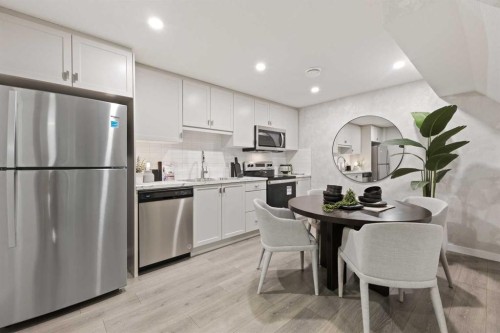 125 Corner Glen Avenue Ne, Calgary, AB - Indoor Photo Showing Kitchen With Stainless Steel Kitchen With Upgraded Kitchen