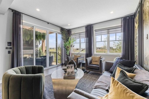 166 Setonstone Green Se, Calgary, AB - Indoor Photo Showing Living Room