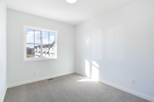 406-1750 Rangeview Drive Se, Calgary, AB - Indoor Photo Showing Other Room