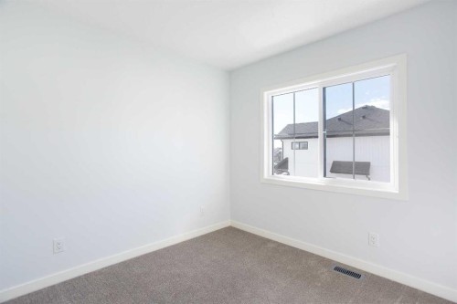 406-1750 Rangeview Drive Se, Calgary, AB - Indoor Photo Showing Other Room