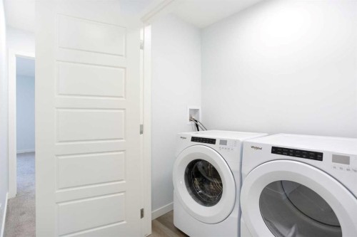 406-1750 Rangeview Drive Se, Calgary, AB - Indoor Photo Showing Laundry Room