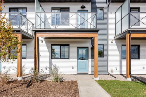 406-1750 Rangeview Drive Se, Calgary, AB - Outdoor With Balcony With Facade