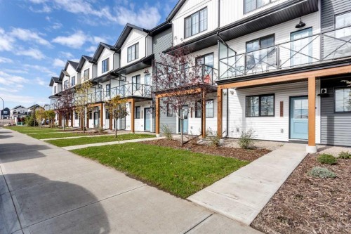 406-1750 Rangeview Drive Se, Calgary, AB - Outdoor With Balcony With Facade