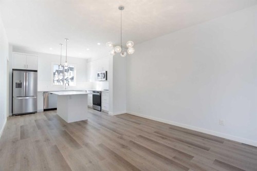 406-1750 Rangeview Drive Se, Calgary, AB - Indoor Photo Showing Kitchen With Upgraded Kitchen