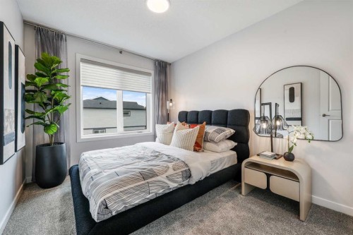 16 Amblefield View Nw, Calgary, AB - Indoor Photo Showing Bedroom