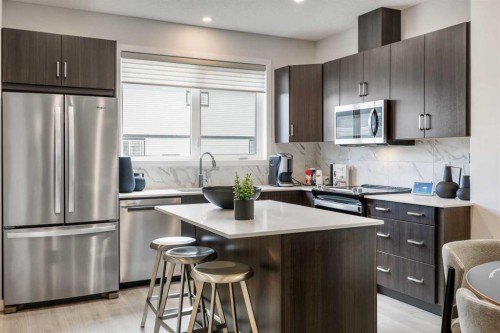 16 Amblefield View Nw, Calgary, AB - Indoor Photo Showing Kitchen With Stainless Steel Kitchen With Upgraded Kitchen