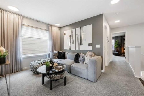 16 Amblefield View Nw, Calgary, AB - Indoor Photo Showing Living Room