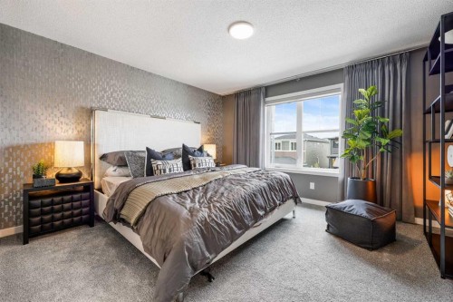 16 Amblefield View Nw, Calgary, AB - Indoor Photo Showing Bedroom