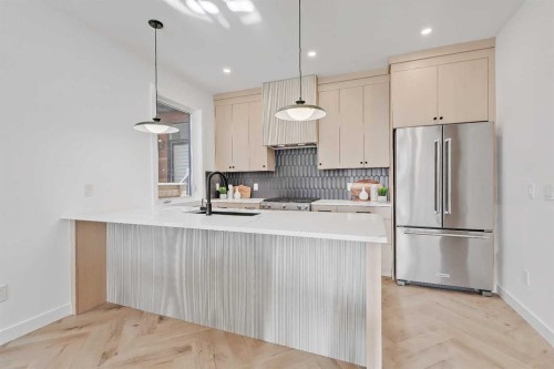 3-1524 29 Avenue Sw, Calgary, AB - Indoor Photo Showing Kitchen With Stainless Steel Kitchen