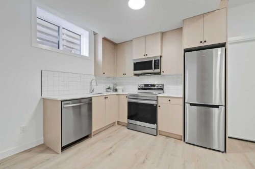 3-1524 29 Avenue Sw, Calgary, AB - Indoor Photo Showing Kitchen With Stainless Steel Kitchen