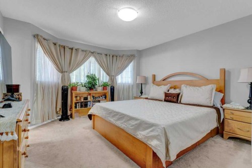 241 Covemeadow Road Ne, Calgary, AB - Indoor Photo Showing Bedroom