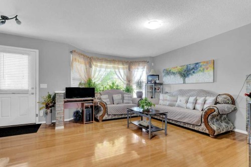 241 Covemeadow Road Ne, Calgary, AB - Indoor Photo Showing Living Room