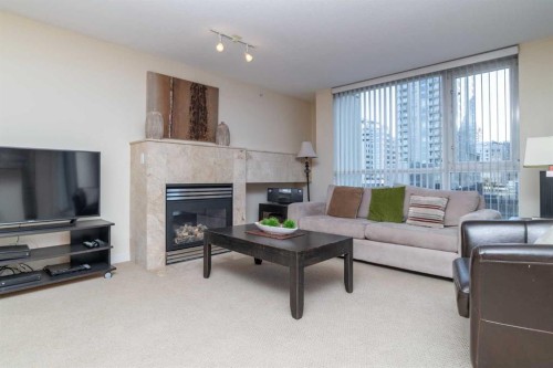 404-1108 6 Avenue Sw, Calgary, AB - Indoor Photo Showing Living Room With Fireplace
