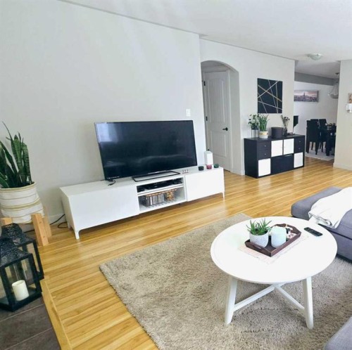 1156 Sherwood Boulevard Nw, Calgary, AB - Indoor Photo Showing Living Room