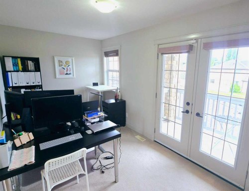 1156 Sherwood Boulevard Nw, Calgary, AB - Indoor Photo Showing Other Room