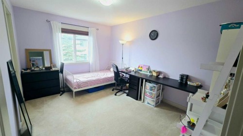 1156 Sherwood Boulevard Nw, Calgary, AB - Indoor Photo Showing Bedroom