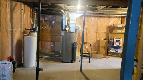 1156 Sherwood Boulevard Nw, Calgary, AB - Indoor Photo Showing Basement