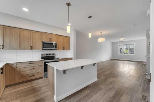 822, 826, 830, 834 Wolf Willow Boulevard Se, Calgary, AB - Indoor Photo Showing Kitchen With Stainless Steel Kitchen With Upgraded Kitchen