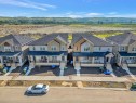 822, 826, 830, 834 Wolf Willow Boulevard Se, Calgary, AB  - Outdoor With Facade 