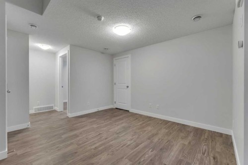 822, 826, 830, 834 Wolf Willow Boulevard Se, Calgary, AB - Indoor Photo Showing Other Room