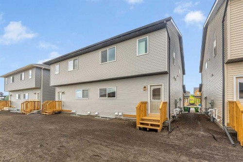 822, 826, 830, 834 Wolf Willow Boulevard Se, Calgary, AB - Outdoor With Exterior