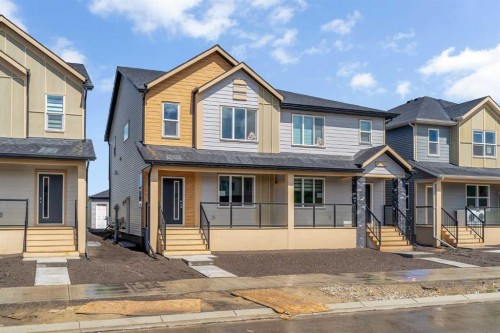822, 826, 830, 834 Wolf Willow Boulevard Se, Calgary, AB - Outdoor With Facade