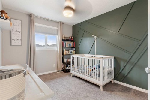 95 Evansborough Common Nw, Calgary, AB - Indoor Photo Showing Bedroom