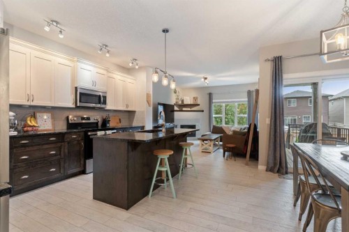 95 Evansborough Common Nw, Calgary, AB - Indoor Photo Showing Kitchen With Upgraded Kitchen