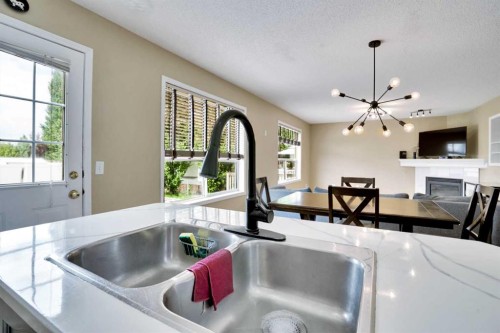 356 Chaparral Drive Se, Calgary, AB - Indoor Photo Showing Kitchen With Double Sink