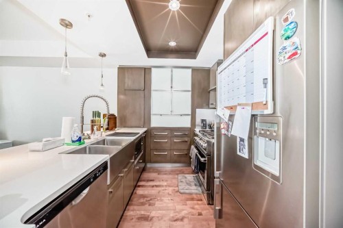 507-10 Shawnee Hill Sw, Calgary, AB - Indoor Photo Showing Kitchen With Stainless Steel Kitchen With Double Sink With Upgraded Kitchen