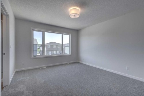232 Creekstone Circle Sw, Calgary, AB - Indoor Photo Showing Other Room