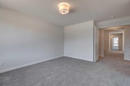 232 Creekstone Circle Sw, Calgary, AB - Indoor Photo Showing Other Room