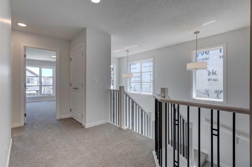 232 Creekstone Circle Sw, Calgary, AB - Indoor Photo Showing Other Room