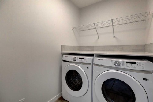 232 Creekstone Circle Sw, Calgary, AB - Indoor Photo Showing Laundry Room