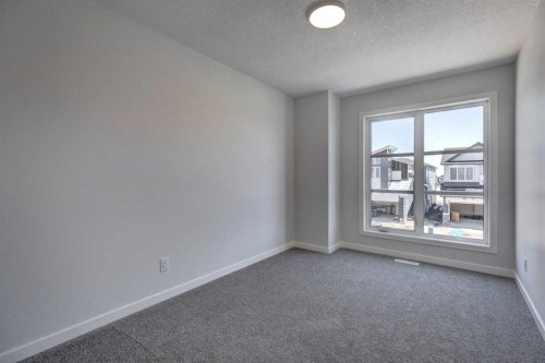 232 Creekstone Circle Sw, Calgary, AB - Indoor Photo Showing Other Room