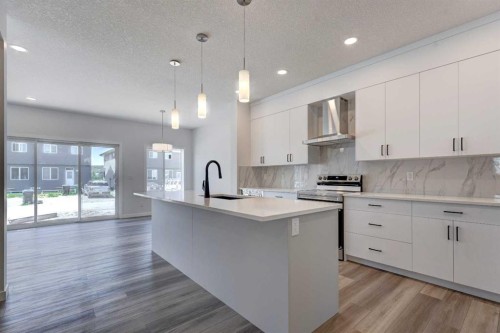 232 Creekstone Circle Sw, Calgary, AB - Indoor Photo Showing Kitchen With Upgraded Kitchen