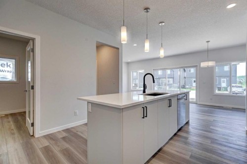 232 Creekstone Circle Sw, Calgary, AB - Indoor Photo Showing Kitchen With Upgraded Kitchen
