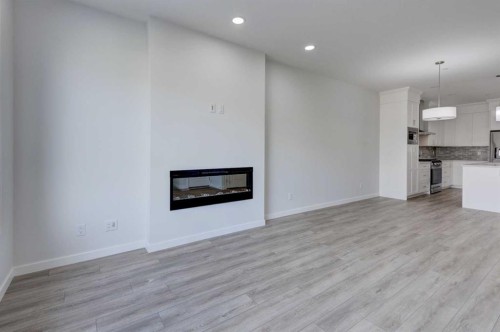116 Herron Walk Ne, Calgary, AB - Indoor With Fireplace