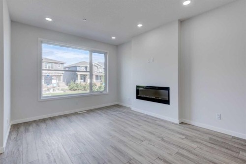 116 Herron Walk Ne, Calgary, AB - Indoor Photo Showing Living Room With Fireplace