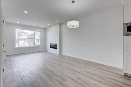 116 Herron Walk Ne, Calgary, AB - Indoor With Fireplace
