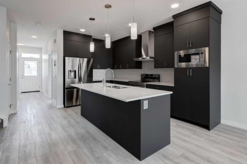 905 Livingston View Ne, Calgary, AB - Indoor Photo Showing Kitchen With Stainless Steel Kitchen With Double Sink With Upgraded Kitchen